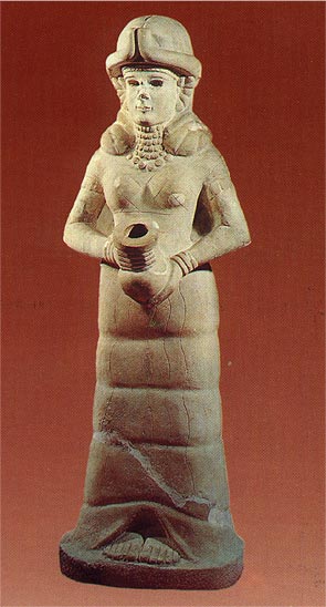 sumer i akad - Bogini z wazą, posąg z pałacu w Mari, XVIII w. p.n.e.jpg